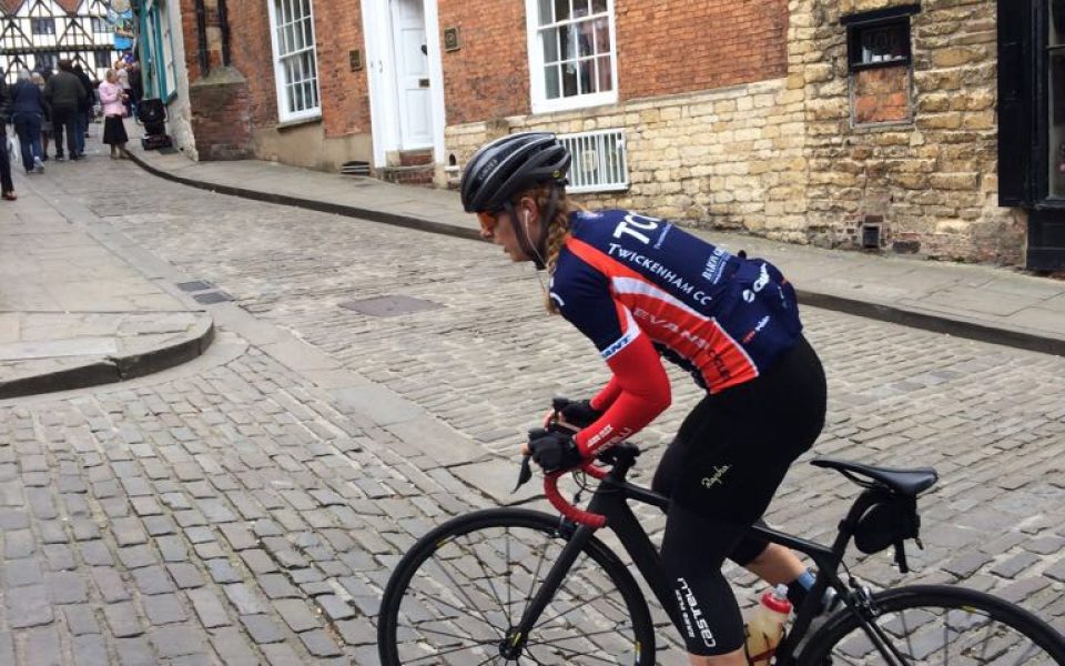 Hannah Nicklin, on the bike, just at the top of Michaelgate, on a recce of the Lincoln GP course