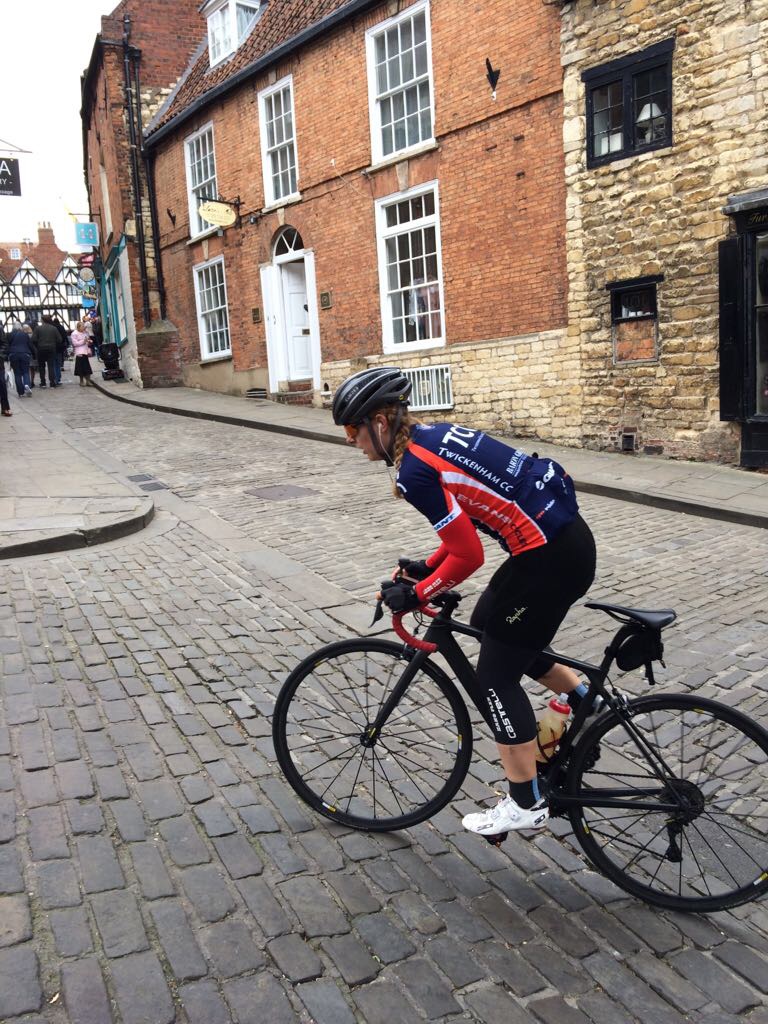 Hannah Nicklin, on the bike, just at the top of Michaelgate, on a recce of the Lincoln GP course
